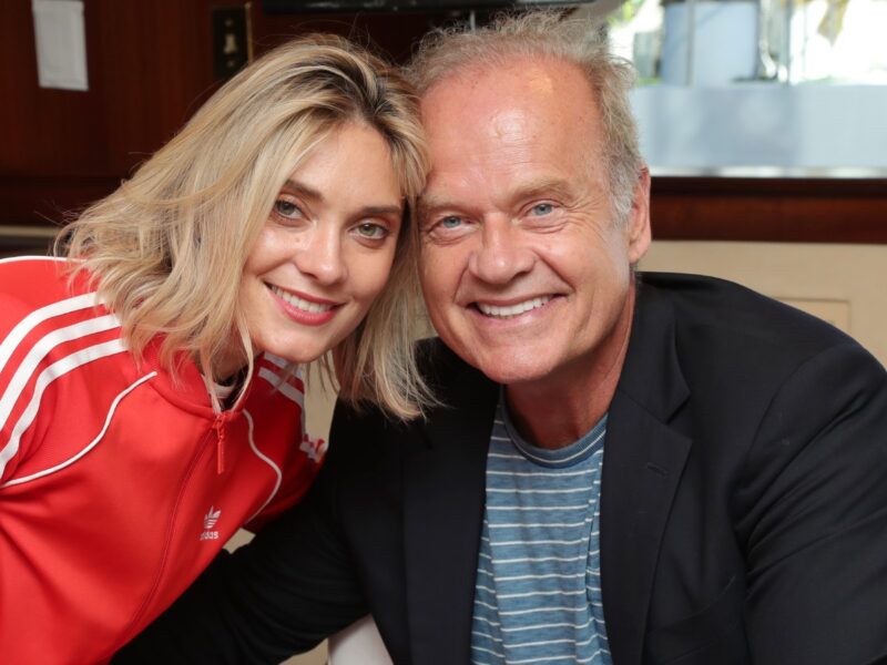 Kelsey Grammer (R) and Spencer Grammer smiling with their heads together