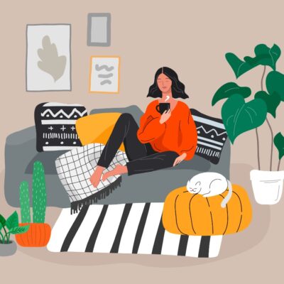 Stock image illustration of a woman sitting on a gray couch surrounded by a cat, plants, and art on the wall