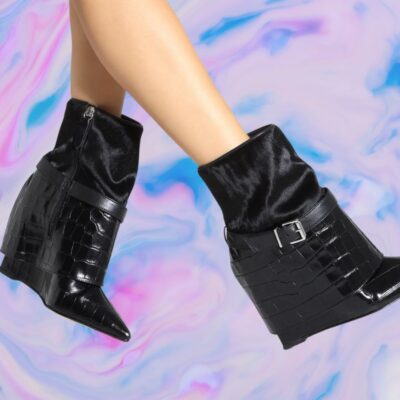 black foldover wedge boots embossed with buckle