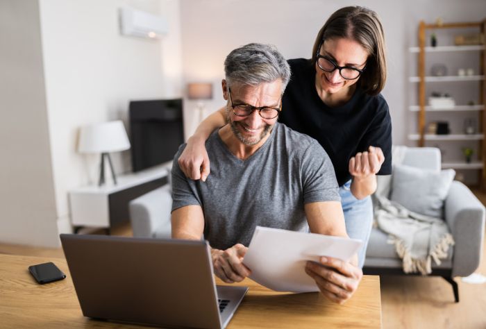 Older couple achieving financial goals together