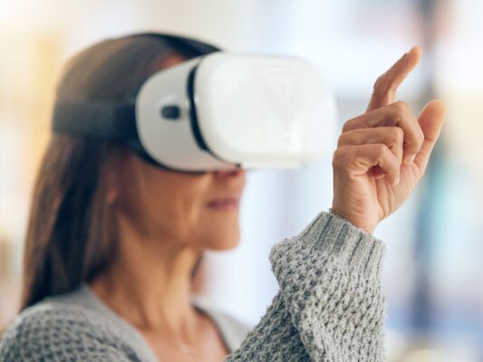 Woman playing a virtual reality video game