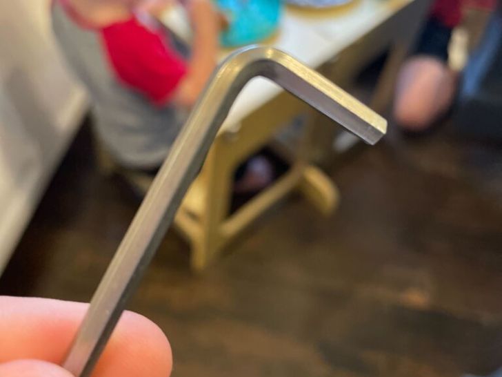 A closeup of an Allen wrench used to assemble the Mini Chef Convertible Helper Tower
