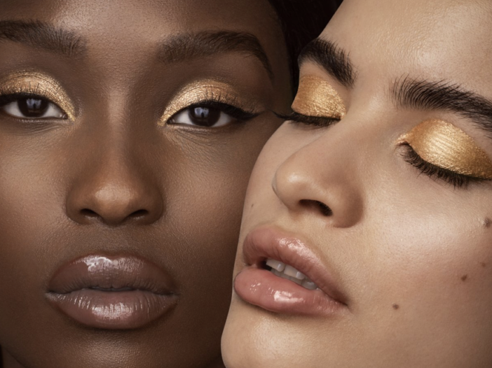 Image of two women modeling CTZN Cosmetics products.